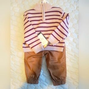 The brand is Happy Fella, 12 M,Grey